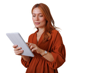 Woman with red hair holding tablet, browsing internet, using modern mobile technology, transparent background