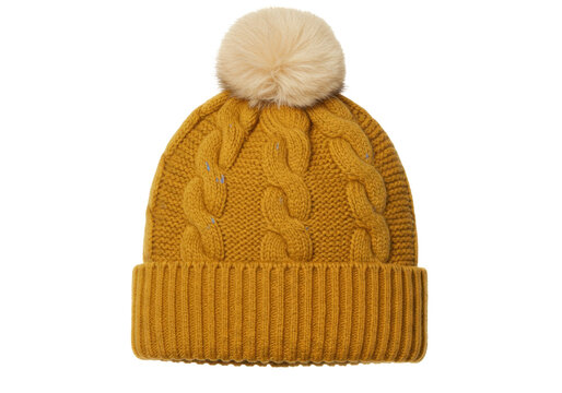 Isolated orange knit hat with pompom, handmade and fashionable headwear for cold winter days