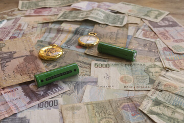 rechargeable batteries on vintage international currency banknotes