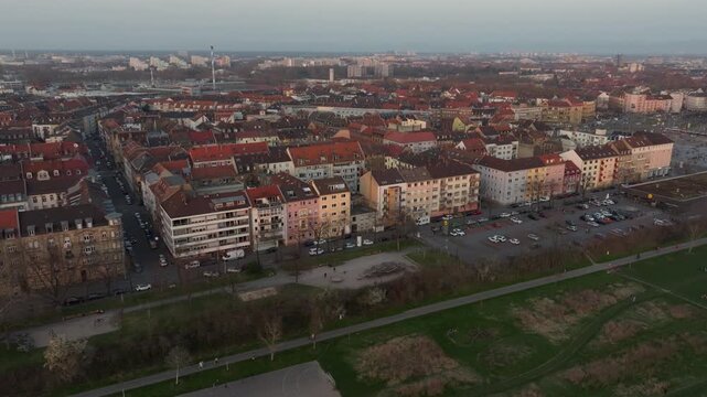 Aerial view moving over a residential neighborhood in Mannheim, Germany, revealing urban landscape and traditional buildings