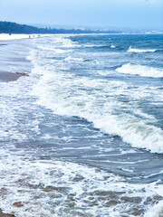 Winter Landscape: Waves and Snow-Covered Shore