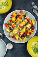 Fish skewers on a BBQ, seafood.