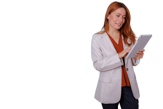 Confident businesswoman with red hair using digital tablet for modern business communication on transparent background