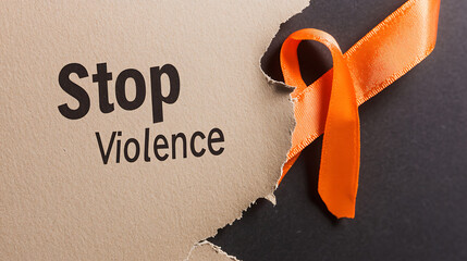 A heartfelt call to action against violence, symbolized by the impactful message "Stop Violence" alongside an orange ribbon, representing solidarity and commitment to a safer world.