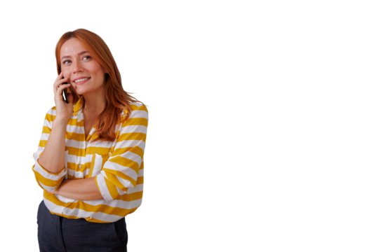 Cheerful redhead woman smiling, holding smartphone to ear, communicating on call with transparent background