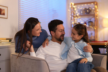 Happy family in festive decorated room. Christmas celebration