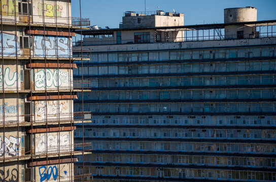 Decaying Brutalist Buildings Graffiti-Covered Abandoned Hotel Facades