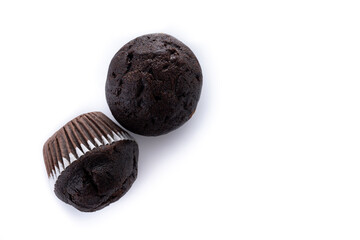 Homemade chocolate muffins isolated on white background. Copy space