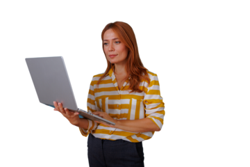 Woman freelancer working on laptop, managing business remotely, standing in professional striped shirt