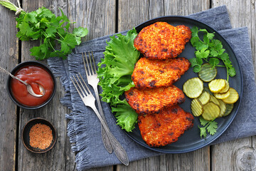 Paprika-Rubbed Pork Chops on a grey plate