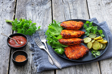 Paprika-Rubbed Pork Chops on a grey plate