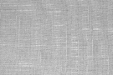 Light grey linen fabric texture background, seamless pattern of natural textile.