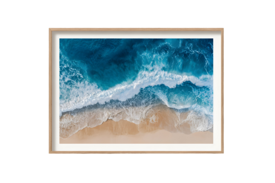 Aerial view of ocean waves crashing on sandy beach