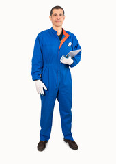 Full length portrait of a worker standing and holding a digital tablet isolated on white background