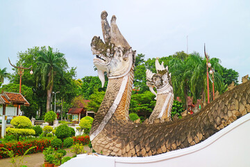 Naga Sculpture along staircase of Wat Phumin Buddhist temple, a mythical serpentine being in Nan Province, Northern Thailand