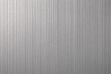 Obraz premium Brushed Metal Surface Texture. A smooth silver metal background with subtle vertical grain, offering a clean industrial look ideal for modern design and minimalist visual layouts.
