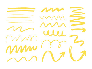 Obraz premium Yellow hand-drawn scribbles, lines, and arrows on a white background.