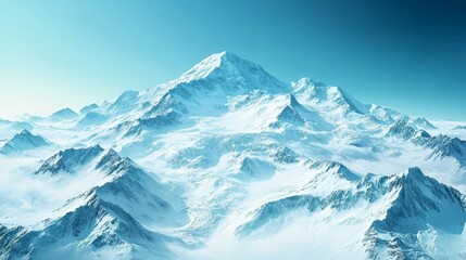 Obraz premium Stunning Snow-Capped Mountain Peaks Under a Clear Blue Sky in a Beautiful Winter Landscape Scene