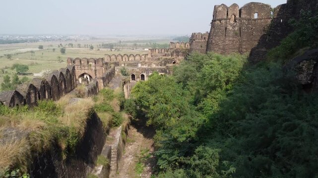 Historic view of Langar Khani Gate pathway and arched walls inside Rohtas Fort Pakistan showing Mughal era architecture