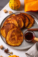 Pumpkin pancakes with maple syrup