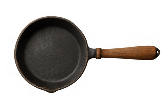 Cast iron frying pan with wooden handle top view isolated on transparent background, a kitchen essential for cooking