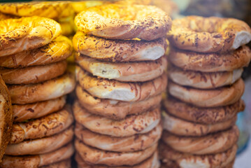 delicious traditional national Polish food obwarzanek krakowski bagel at the Christmas fair