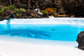 Jameos del agua swimming pool and volcanic rocks in lanzarote