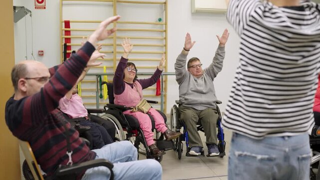 Inclusive group physical therapy session for people with disabilities