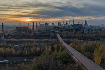 Aerial drone view of Industrial steel factory, iron works. Metallurgical plant. steelworks. Heavy industry in Europe, Poland, Dabrowa Gornicza. Air pollution from chimneys. Ecology and environmental