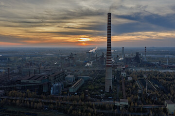 Aerial drone view of Industrial steel factory, iron works. Metallurgical plant. steelworks. Heavy industry in Europe, Poland, Dabrowa Gornicza. Air pollution from chimneys. Ecology and environmental