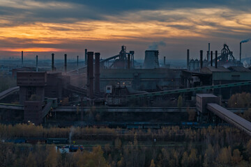 Aerial drone view of Industrial steel factory, iron works. Metallurgical plant. steelworks. Heavy industry in Europe, Poland, Dabrowa Gornicza. Air pollution from chimneys. Ecology and environmental
