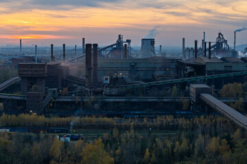 Aerial drone view of Industrial steel factory, iron works. Metallurgical plant. steelworks. Heavy industry in Europe, Poland, Dabrowa Gornicza. Air pollution from chimneys. Ecology and environmental