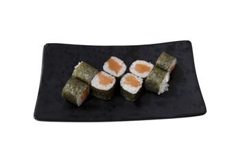 Salmon maki sushi rolls on black plate