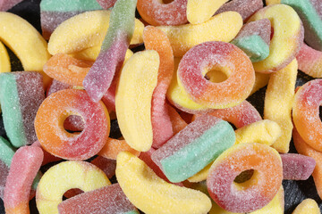 Assorted colorful gummy candies. Top view. Jelly sweets