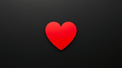 An abstract red heart shape on a matte black background, emphasizing minimalist design with negative space.