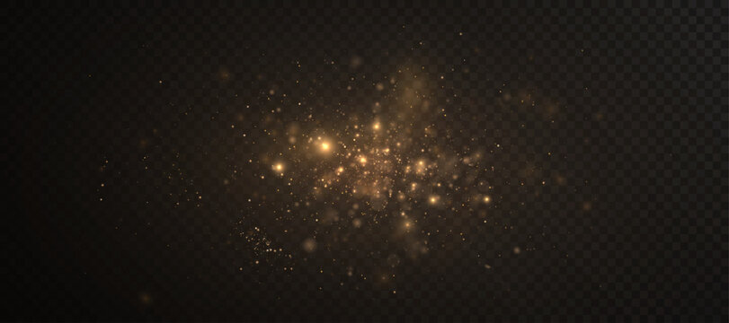 Glowing gold dust with swirls and floating sparks on a black background. Warm particles explode into a soft glowing haze to create magical light overlays.