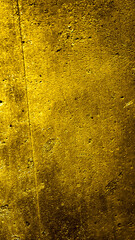 wall painted with gold paint with an interesting texture