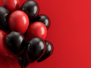 Vibrant Black and Red Balloons Against a Bold Red Background