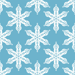 Seamless winter snowflake pattern with elegant white snow crystals on a soft blue background, perfect for Christmas wrapping paper, holiday textiles, wallpapers, and festive seasonal designs.