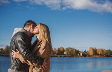 Romantic European couple in the park love, warmth and emotional connection