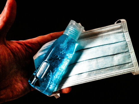 Antibacterial fluid and mask. Coronavirus protection kit.