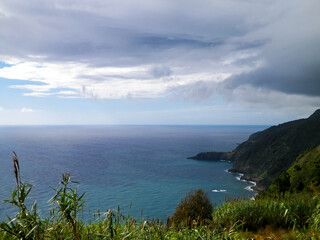 Beautiful nature of Azores. Rocky coast at stormy day at Sao Miguel Island.