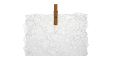 Textured torn paper with a wooden clothespin holding it