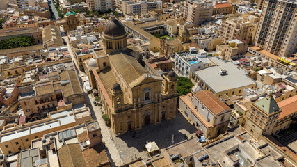 Fototapeta premium Aerial view of Marsala Cathedral, in province of Trapani, Sicily, Italy. It's the largest church in the town and has a Baroque style facade. It is dedicated to the Anglo-Norman saint Thomas Becket.