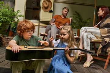 Parents enjoy quality moments with children while camping under the stars