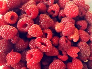 raspberries on a white background