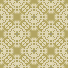 Beautiful Christmas seamless vector snowflake texture on gold colour background. Monochrome seasonal pattern for wrapping paper, greeting cards, invitations, gift boxes and web background.