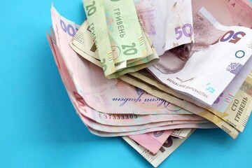 Big amount of different Ukrainian hryvnia money bills. Pile of crumpled ukrainian banknotes