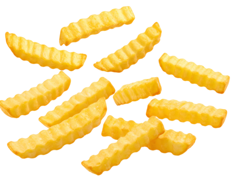 Golden, wavy-cut potato strips scattered on black
