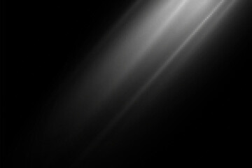 Abstract glowing rays of light on black background. 